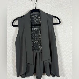 Must Have Black and Gray Lace vest with tie in the back. Size medium.